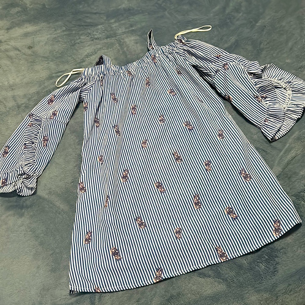 Blue and white dress with pineapples on it for little girls